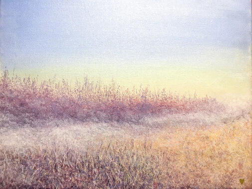 a soft gold wheat field with fog at its edges. the fog fades against a line of pink trees. the sky is a light blue and yellow.